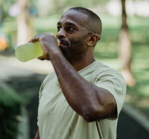A patient hydrates after learning about weight loss solutions near South Bend, IN