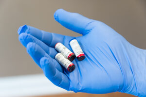 A provider prepares hormone pellets for a patient looking to lose weight before tumescent liposuction treatments in Mishawaka, IN.